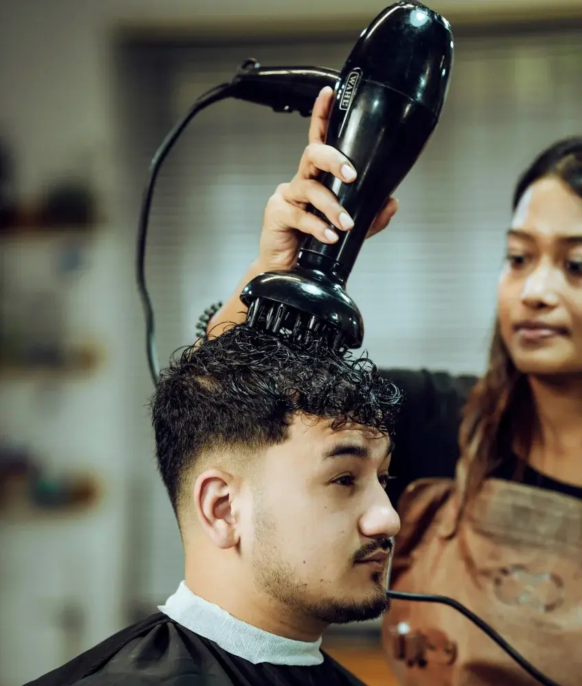 Barber doing a haircut